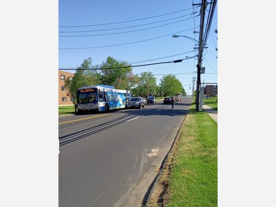 Car Collides with City Bus