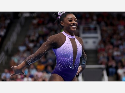Biles breaks a gymnastics record.