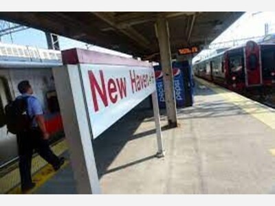 Heavy rain and flooding temporarily suspend Metro North New Haven line service.